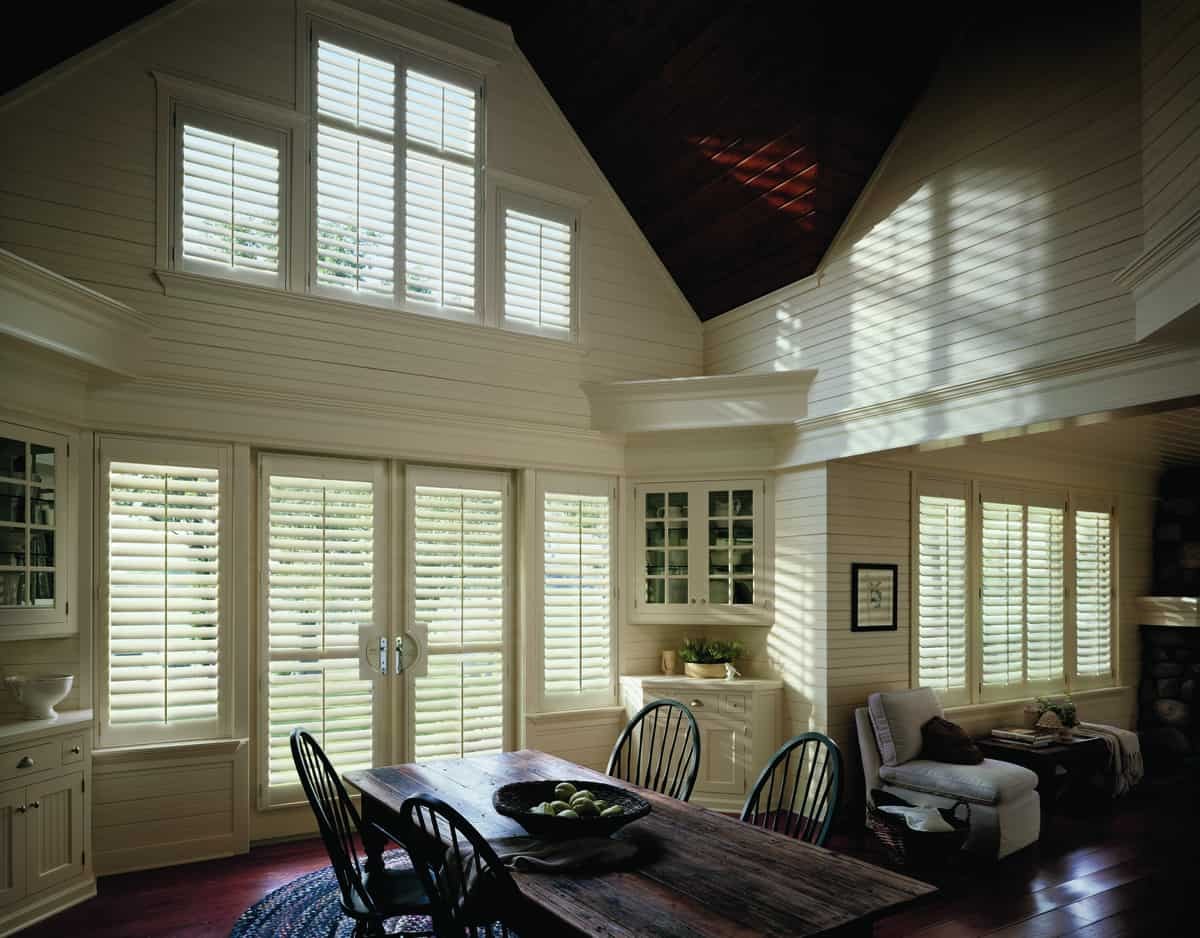 Heritance® Hardwood Shutters Miami, Florida (FL) popular granny chic décor with floral prints and natural woods.