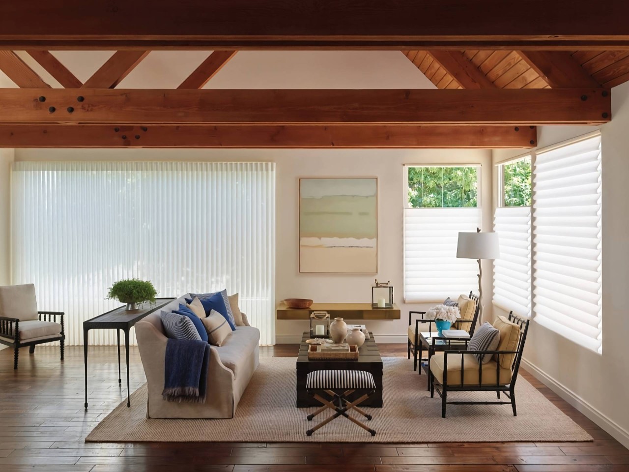 Stylish and sophisticated Vignette® Roman Shades, Hunter Douglas window treatments for living rooms, on windows at Fine Shadings & Décor near Miami, FL